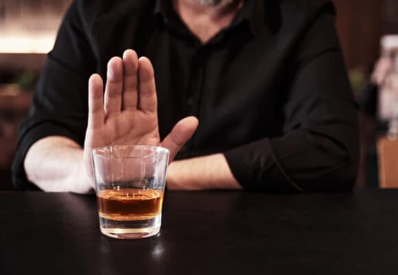 Understanding Alcohol Addiction: Exploring the Causes, Signs, and Symptoms of Alcohol Addiction